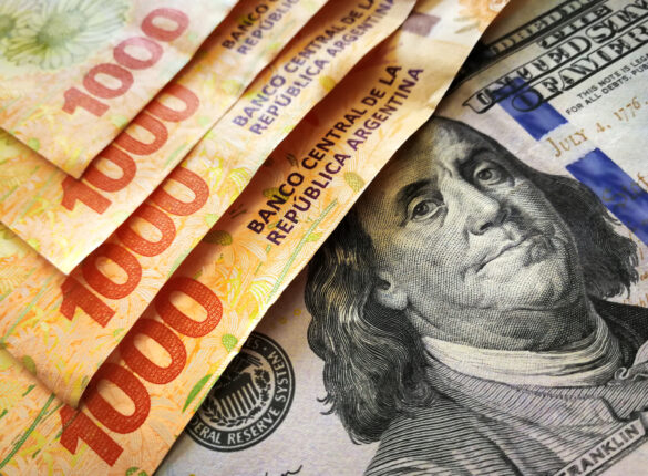 Argentine banknotes of 1000 pesos and american one hundred dollar bill