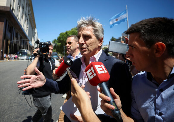 FILE PHOTO: Argentina's Minister of Economy Luis Caputo speaks to the press, one day after the inauguration of Argentina's President Javier Milei, in Buenos Aires, Argentina, December 11, 2023. REUTERS/Agustin Marcarian/File Photo
