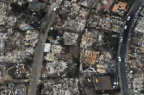 FILE PHOTO: An aerial view shows the burnt remains of houses following the spread of wildfires, in Vina del Mar, Chile February 4, 2024. REUTERS/Sofia Yanjari/File Photo