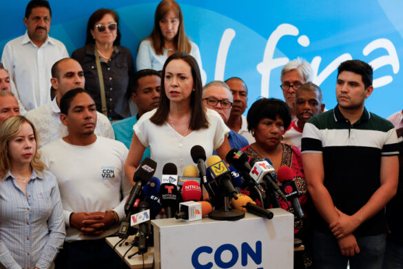FILE PHOTO: Venezuelan opposition leader Maria Corina Machado, who is barred from holding public office, addresses the media after Venezuela's opposition coalition failed to register a candidate to run in the country's July presidential election, in Caracas, Venezuela March 26, 2024. REUTERS/Leonardo Fernandez Viloria/File Photo