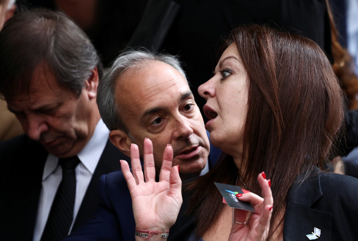 Argentine Education Secretary Carlos Torrendell and Minister of Human Capital Sandra Pettovello attend a ceremony, to pay homage to the victims of the 1992 Israeli embassy bombing, in Buenos Aires, Argentina, March 18, 2024. REUTERS/Agustin Marcarian
