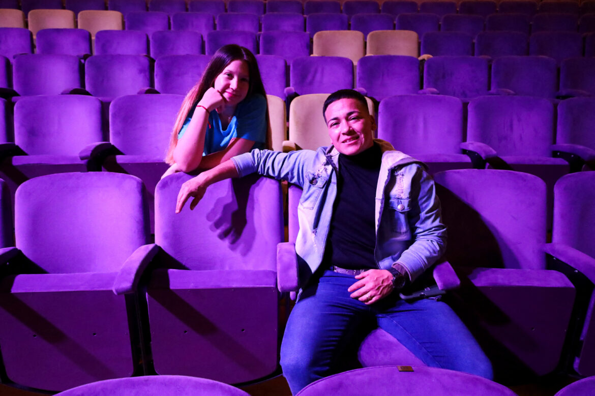 Former prisoners Yoseli Arias and Ignacio Rodriguez pose for a picture in the seats of the "Presidente Alvear" theatre, before starting the play "The Days Out There", in Buenos Aires, Argentina June 7, 2024. REUTERS/Cristina Sille