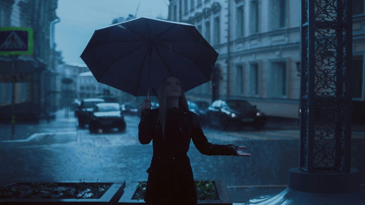 Woman in rain. Credit: Pixabay at Pexels