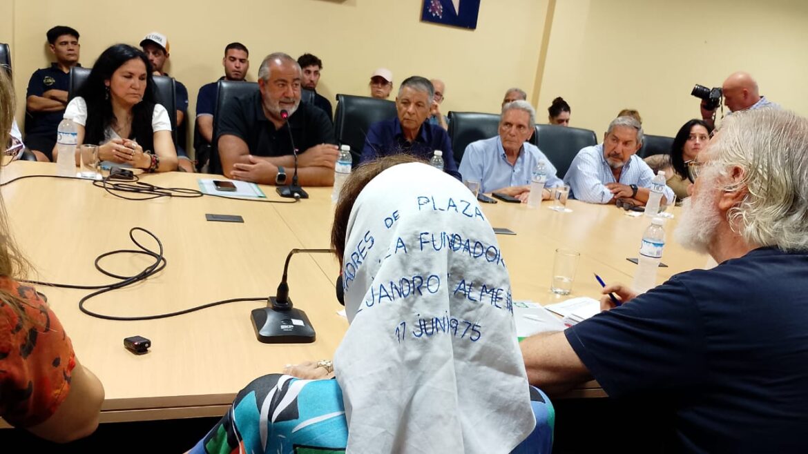 Taty Almeida sits opposite the CGT leadership trio. Buenos Aires, January 2025. Photo: Amy Booth