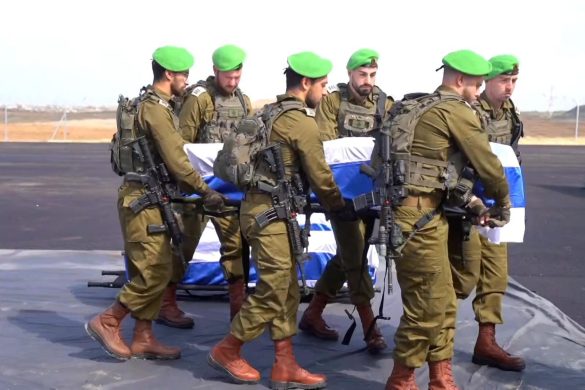 IDF forces carry a coffin with one of the bodies handed over by Hamas. Credit: IDF X account