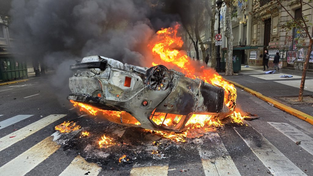 A car burns during protests by pensioners and football fans in Buenos Aires, Argentina, March 12, 2025. Photo: Buenos Aires City Government