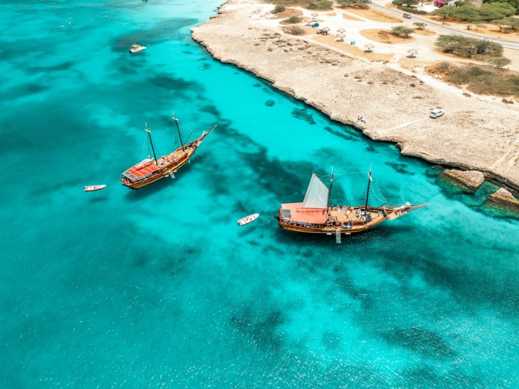 Jolly Pirates Aruba, two 85 foot teak schooners that offer snorkeling trips and sunset sails