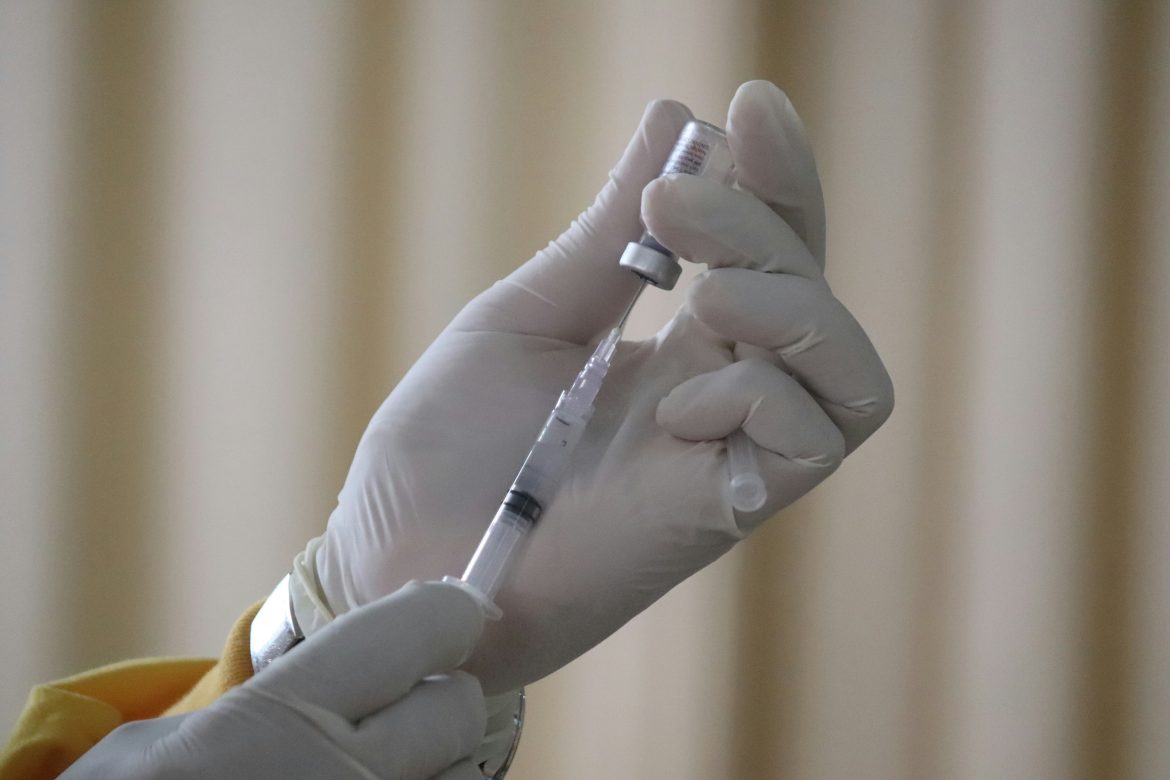 Vaccination vaccine. Mufid Majnun via Unsplash